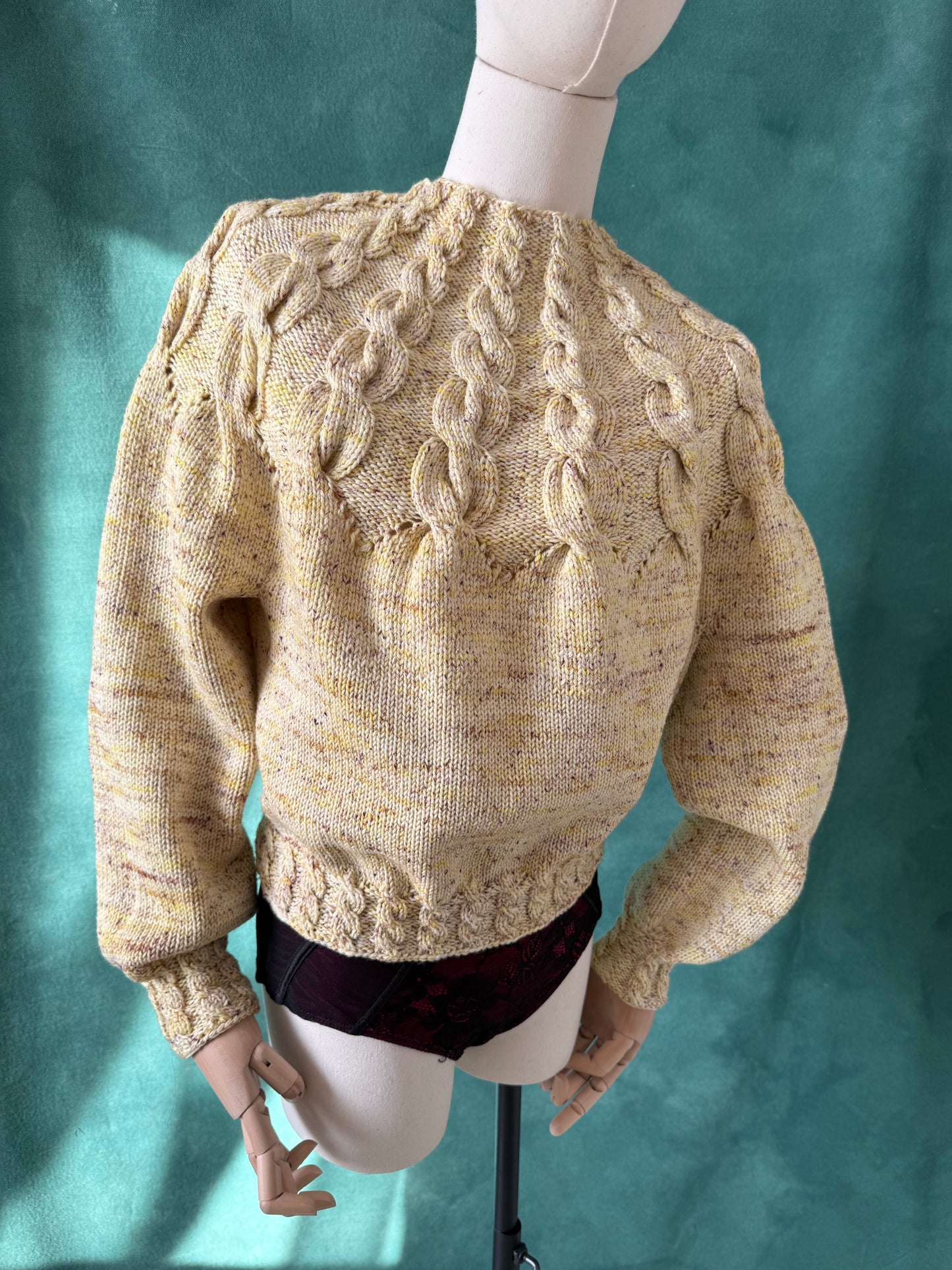 KARINIA merino wool sweater with braided details